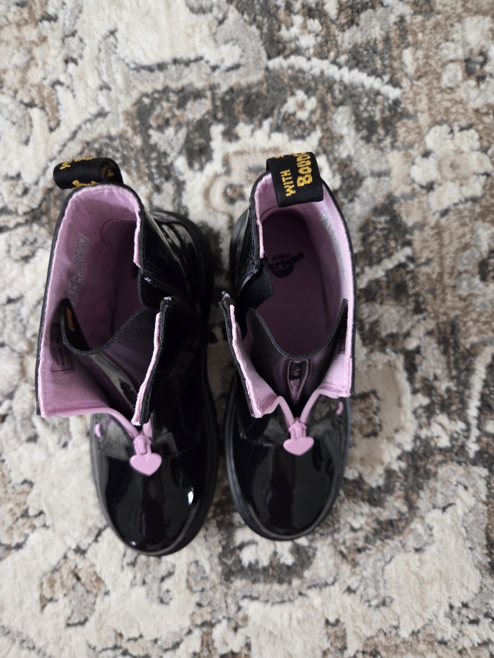 Dr. Martens Kids Black Patent Boots with Pink Lining and Heart Zipper Pulls
